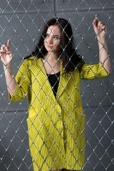 Portrait of a young beautiful woman in studio.