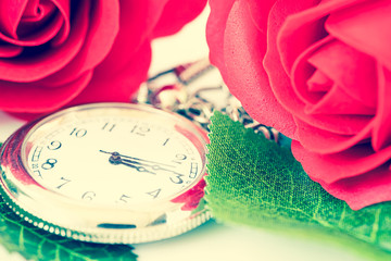 Close up Gold ring and Red roses