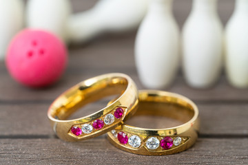 Wedding rings with bowling pin