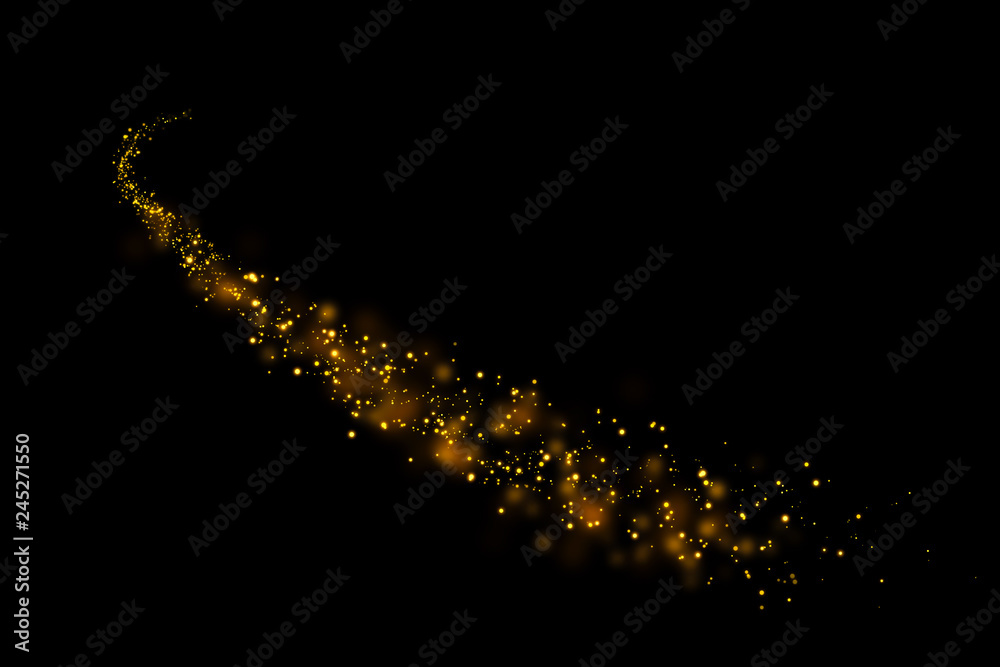 Wall mural gold glitter particles lights trail and bokeh on a black background. abstract line sparkle texture.