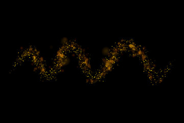 Gold glitter particles lights trail and bokeh on a black background. Abstract line sparkle texture.