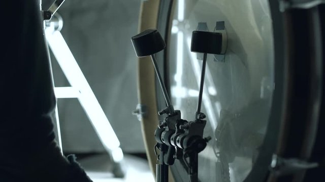 Bass drum pedal in action. Single kicks in the bass drum. Close-up footage. 4k.