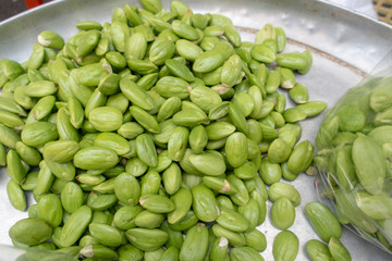 Bitter bean for sale in Market.Parkia speciosa, Zeliang Naga calls it Kampi is a plant of the genus Parkia in the family Fabaceae. It bears long, flat edible beans with bright green seeds the size 
