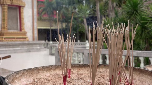 incenses burning at temple