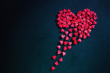 Red heart on black.