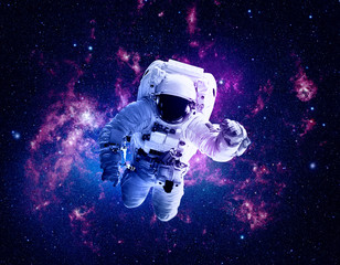 Obraz na płótnie Canvas Astronaut Afloat - Elements of this Image Furnished by nASA