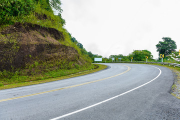 Curve road signs on down hill. Many warning sign indicating for safety
