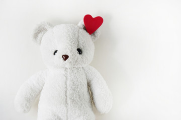 White teddy bear and empty space for text. Day of Love on Valentine's lonely.