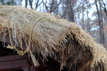 A wooden roof made of wood and straw