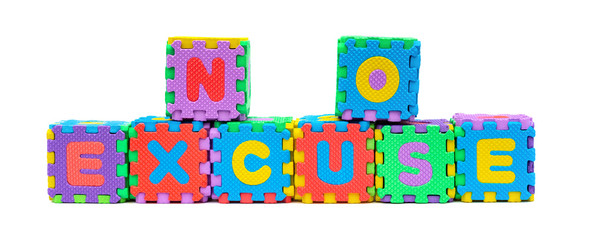 NO EXCUSE shaped by alphabet jigsaw puzzle on white