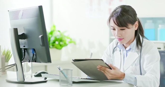 woman doctor use digital tablet