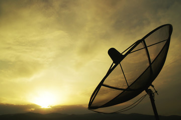 Satellite Dish with Mountain Background at Twilight