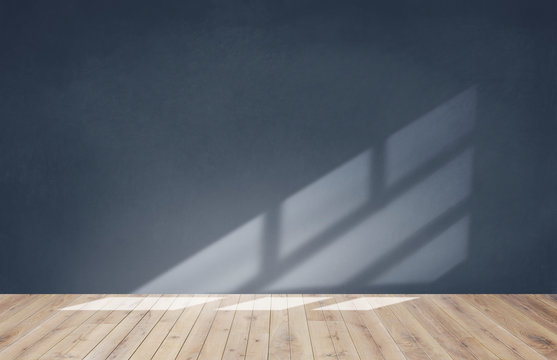 Blue Wall In An Empty Room With Wooden Floor