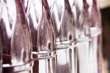 Row of plastic bottles.Home brewed wine in plastic bottles.Bottles close up