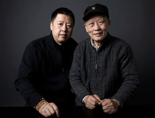 Portraits of Asian Chinese characters, father and son. indoors