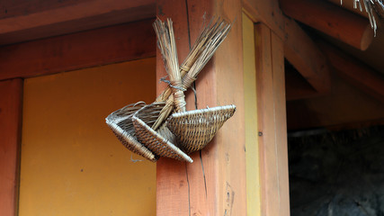 Traditional Korean house and straw cooking utensils