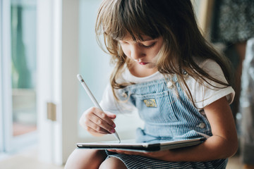 Young girl using a digital tablet