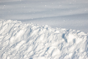 Fototapeta na wymiar snow drifts as background