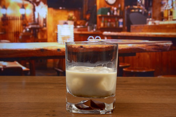 White Russian cocktail in old fashioned glass with ice