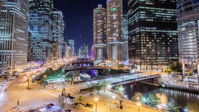 Time Lapse - Skyscrapers of Chicago Skyline at Night by Chicago River - 4K