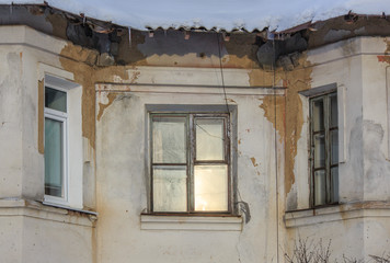 Old building with fallen plaster