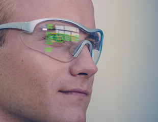 smart glasses futuristic technology concept, man wear smart glasses with augmented reality to...