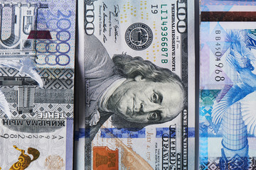 Dollars and tenge. American and Kazakh money close up