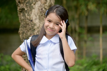 Young Minority Girl Student Wondering Wearing School Uniform