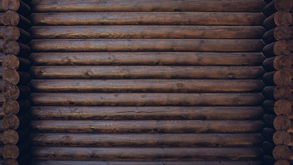 Dark colored wooden cabin wall texture background
