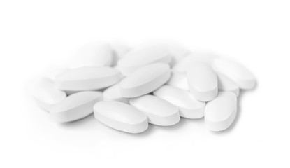 white medicine tablets in selective focus