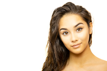 Naklejka premium Mixed race young woman face portrait isolated on white background.