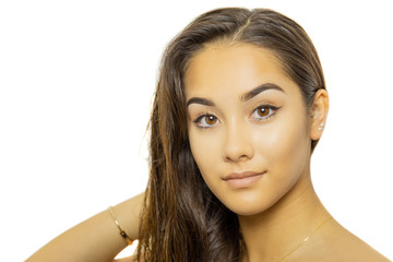 Fototapeta premium Mixed race young woman face portrait isolated on white background.