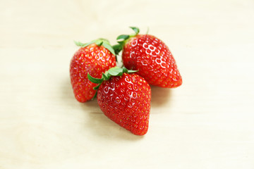 strawberry on wood table with copy space