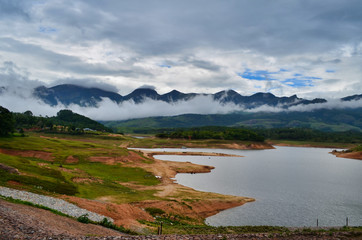 Natural Attractive Mountain with Mist and Waterfront Landscape