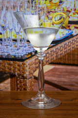 Vesper Cocktail in martini glass decoreted lemon rind