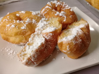 donuts with sugar on plate