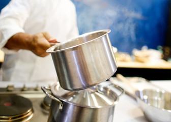 Chef cooking food in the kitchen, Chef preparing food