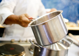 Chef cooking food in the kitchen, Chef preparing food