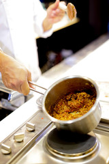 Chef cooking food in the kitchen, Chef preparing food