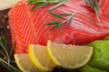 salmon slices with spices background