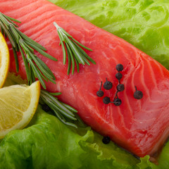 slice of salmon with spices background