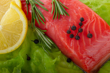 slice of salmon with spices background