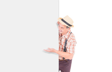 Portrait of senior elderly asian smile man standing and pointing in white blank , isolated on white background .with copy space for Advertising concept