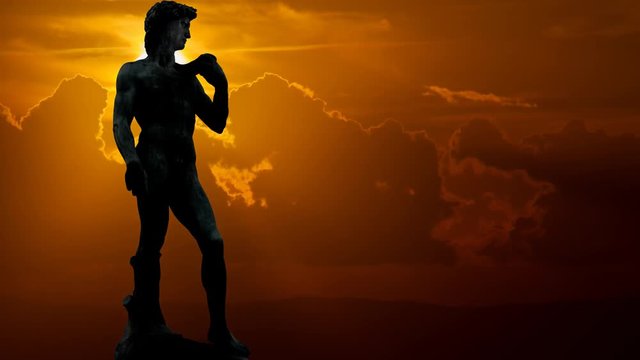 Florence: Statue Of David in Silhouette at sunset, with Red  Sun and Clouds, Florence, Tuscany, Italy