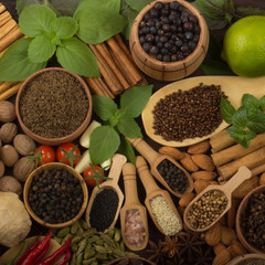 various spices on wooden background
