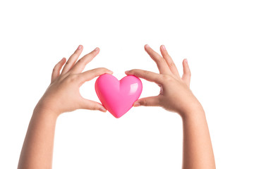Fototapeta premium Pink heart on kid hand isolated on white