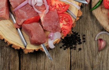shashlik ingredients on wooden background