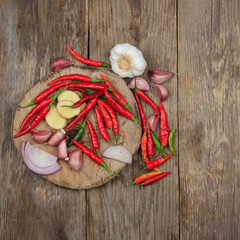 hot spices on wooden background
