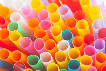 Close up to colorful straws background