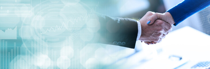 Business agreement with handshake. panoramic banner